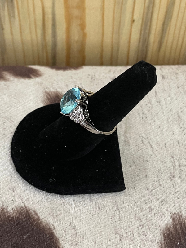 Light Blue Large Oval with Minimal Side Stones Ring