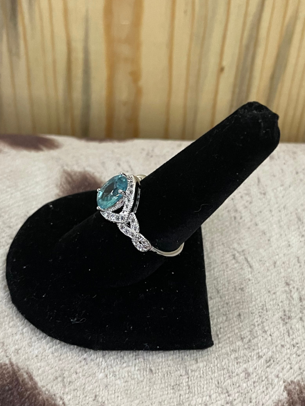 Light Blue Center Stone with Twisted Side Ring
